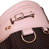 Detail of the gold buckle and premium leather finish on a women's golf bag.