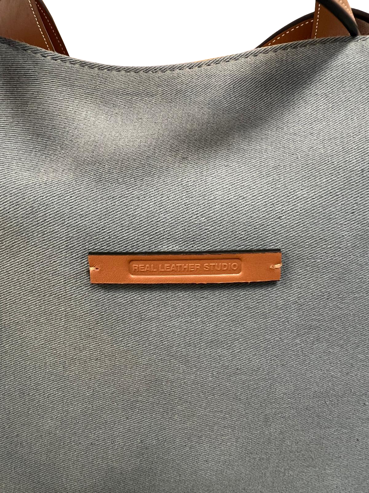 Bolso unisex lona azul piel marron vista zoom