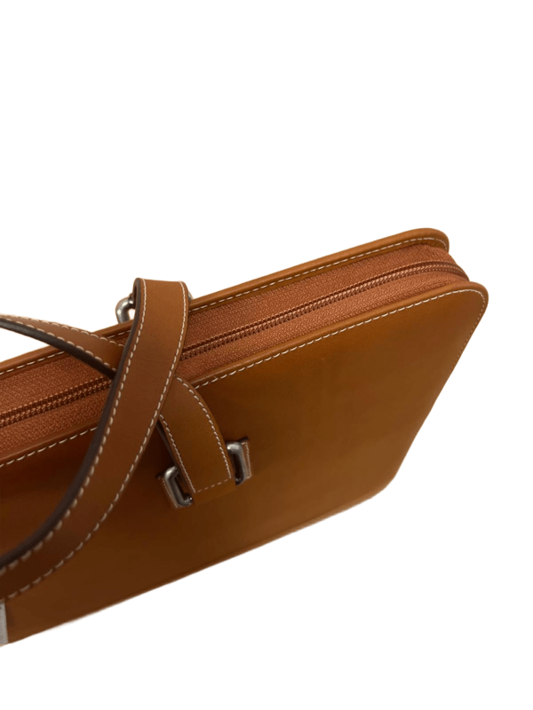 Top view detailing the secure zip closure of the leather document case and the quality edge finishing.