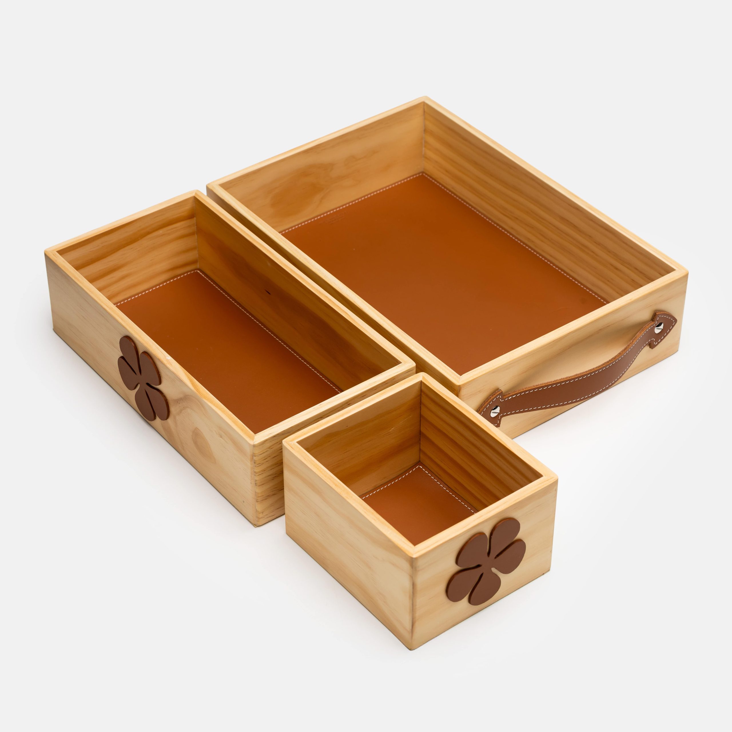 Set of three wooden trays with leather interior
