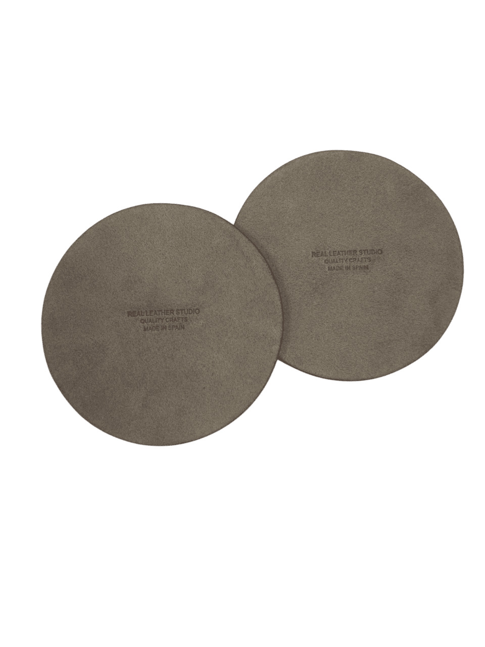 Reverso de un posavasos redondo de piel con el sello "Made in Spain"