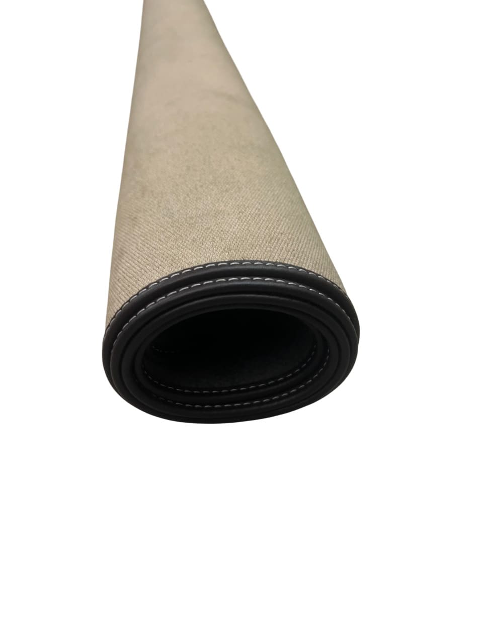 Flexible canvas pet mat partially rolled up, demonstrating soft material.