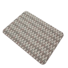 Overhead view of the rectangular pet food mat made of ethnic canvas with a zig-zag pattern.